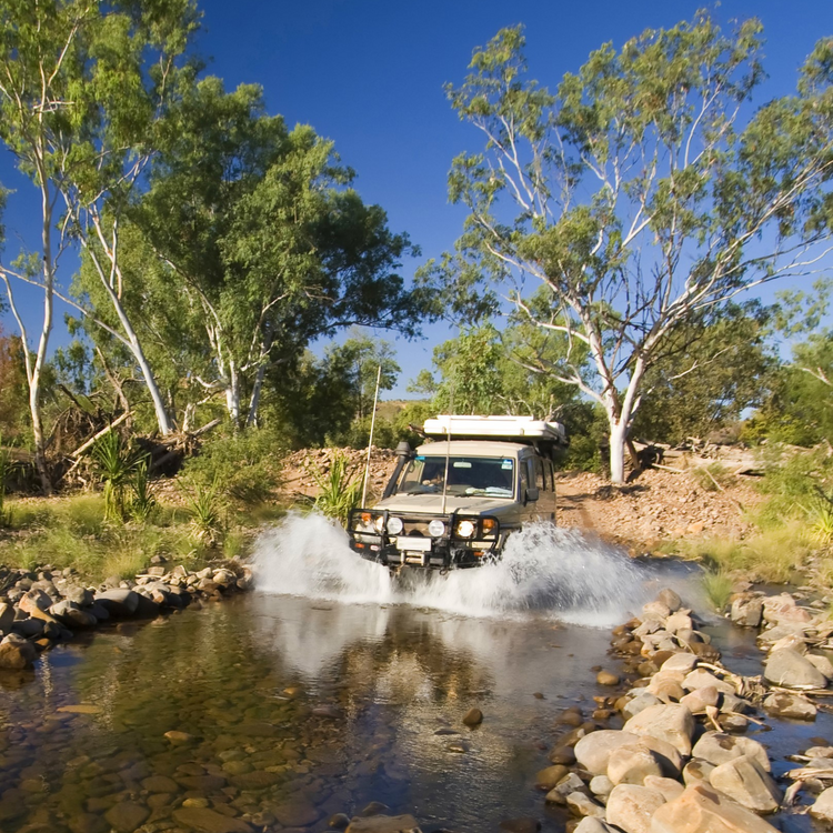 4wd driving off road through creek